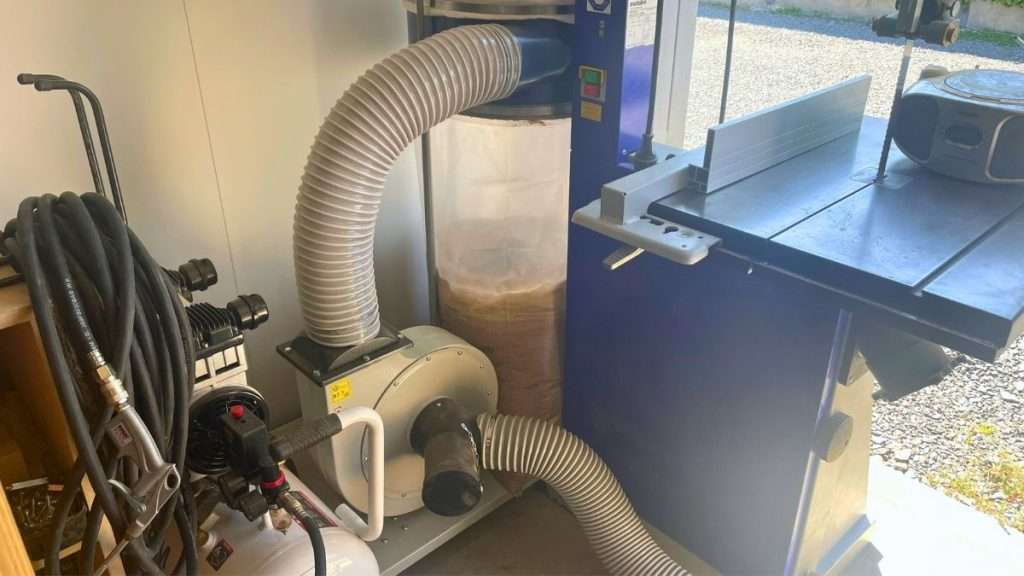 Dust collector installed in a safe workshop to reduce airborne particles and protect breathing.