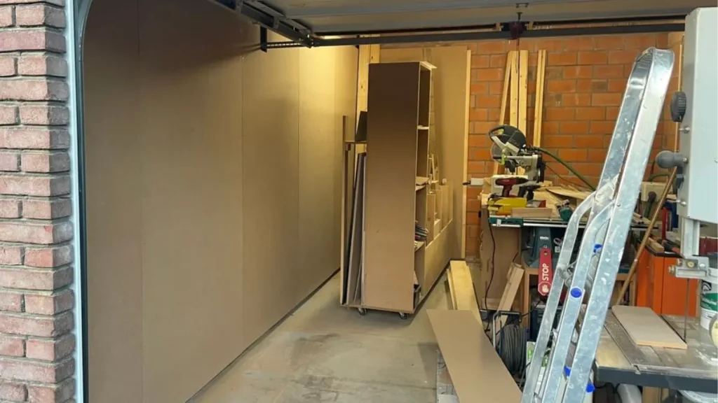 Bare MDF workshop walls before painting and finishing