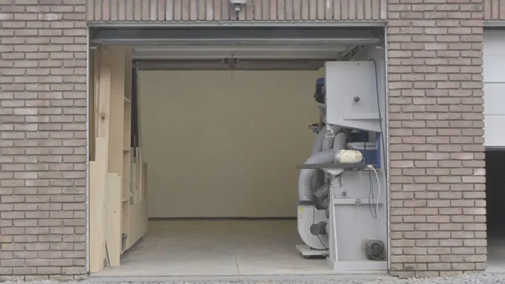 Small garage being converted into a woodworking space, showing how much does it cost to start woodworking at home with limited space