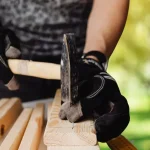 Hand tools being used for woodworking without a shop on a simple outdoor work surface