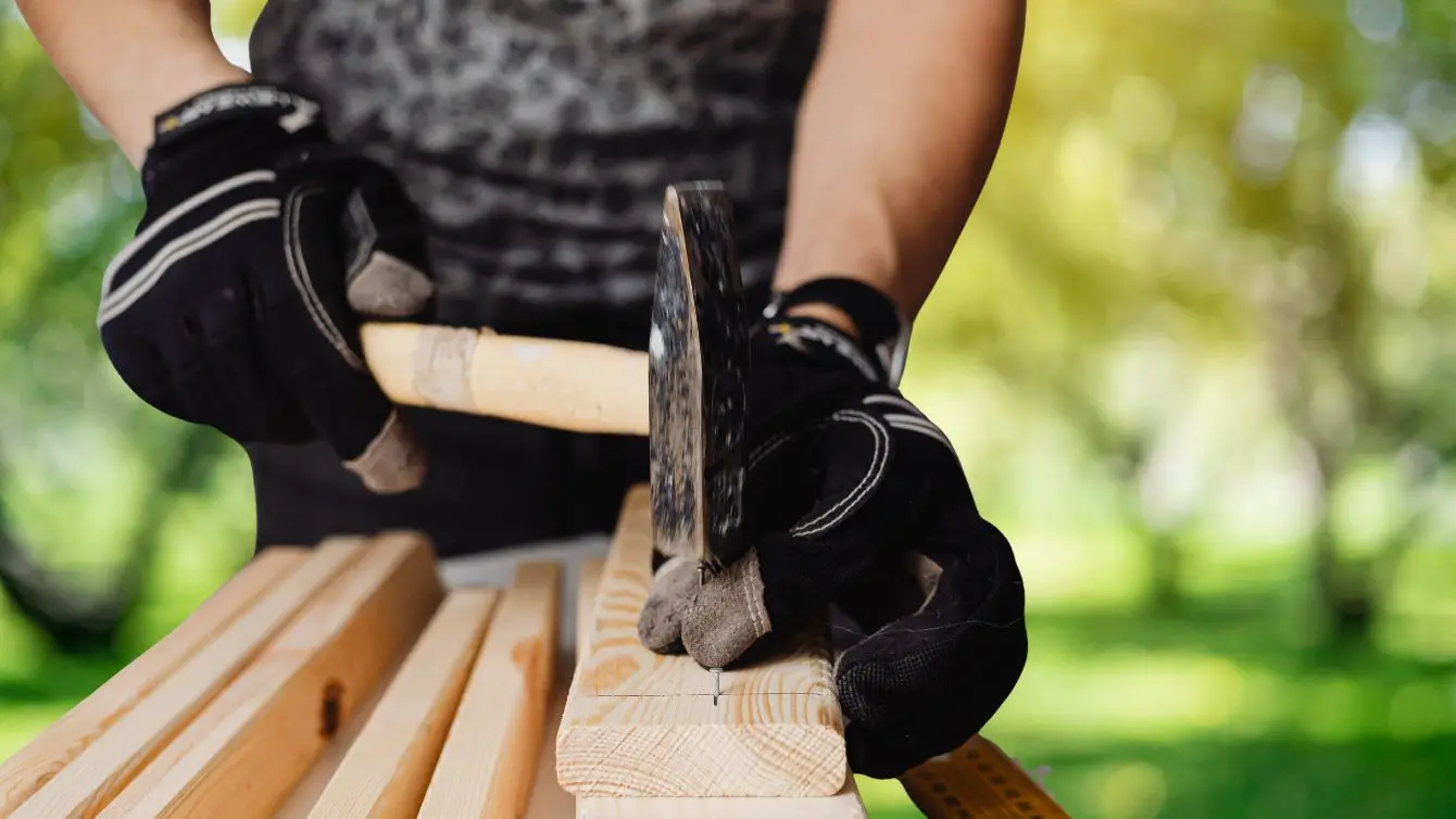 Hand tools being used for woodworking without a shop on a simple outdoor work surface
